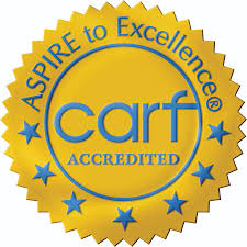 Gold CARF logo.