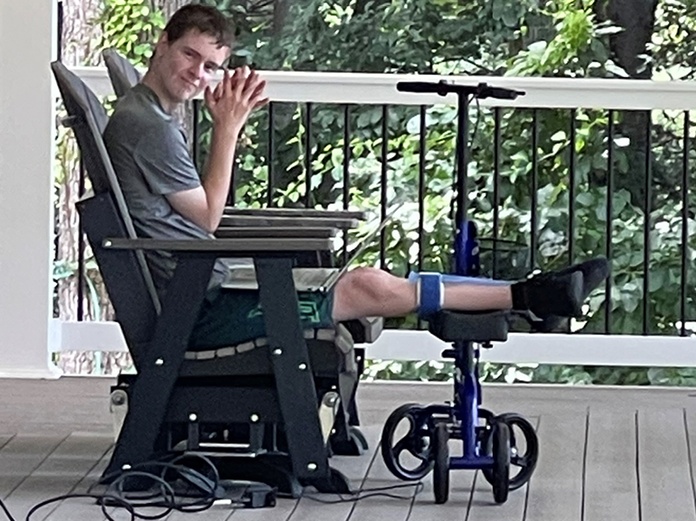 James Taylor on his porch at home following rehabilitation.