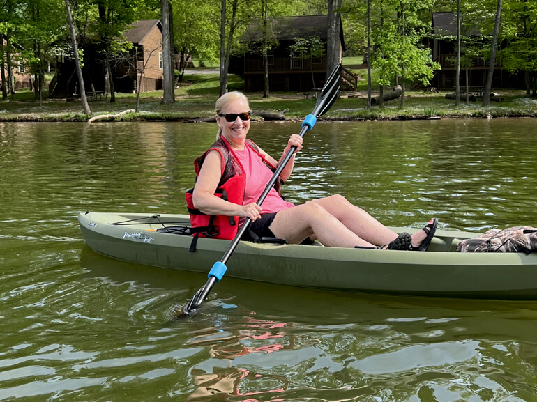 Ruth Kaufman kayaking after rehabilitation.
